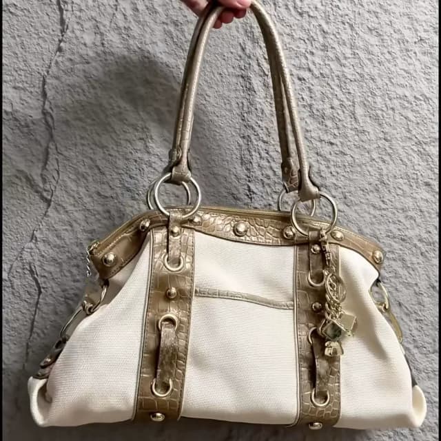 Spring New Style Bag Versatile Retro Commuter Shoulder Bag High-Quality Texture Underarm Bag Rivet Biker Bag