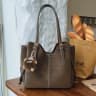 Gray strap with charm