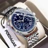 960 silver case with blue dial and steel strap