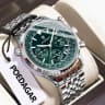 960 silver case with green dial and steel strap