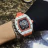 White shell, orange band